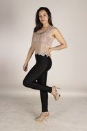 brunette in pants and heels
