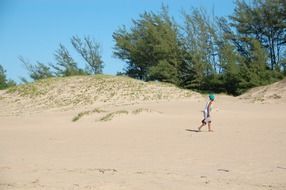small girl in beautiful beach