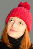 Portrait of woman in a red hat