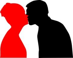 red silhouette of a girl and black silhouette of a young man in kisses