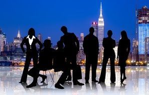 Black silhouettes of businessmen in New York