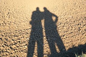 shadows on the sand togetherness