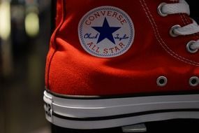 closeup view of red converse shoe