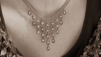 woman neck with necklace close-up