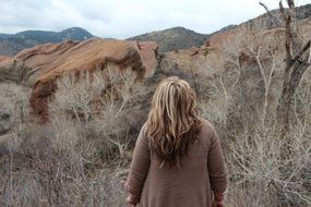woman among nature on a cloudy day