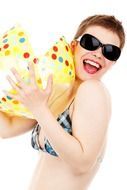 girl in a bikini with a ball