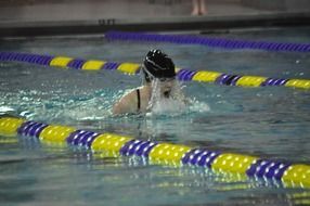 photo of swimmer on the track in the pool