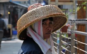 Chinese woman in a straw hat