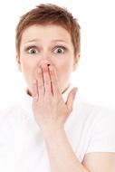 surprised woman showing hand