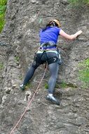 brave girl rises on a rock