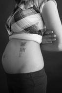 pregnant woman black and white photo