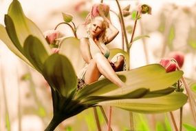 Beautiful Blonde woman in flower decoration