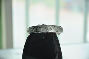 silver bracelet with hieroglyphs