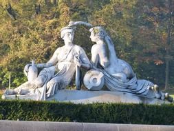old mythology sculpture of man and woman