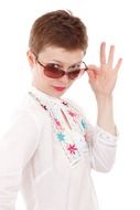 photo of a girl with short hair and sunglasses