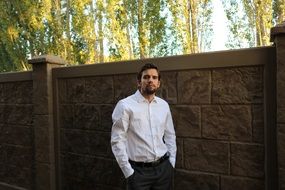 handsome model businessman in white shirt