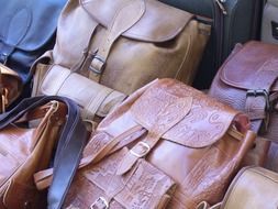 multi-colored leather backpacks on the market