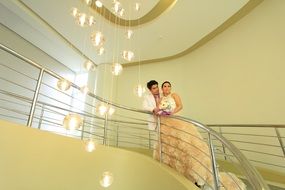 Wedding couple on a beautiful staircase