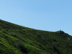 lonely woman stands on a mountain
