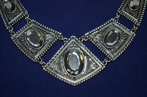 necklace on a blue background