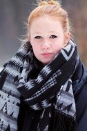 red-haired girl in a warm scarf