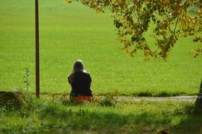 woman on green meadow