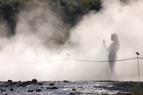 Woman silhouette in a fog