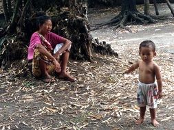Asian woman and child