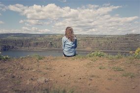 lonely girl near the mountain