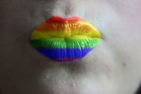 Rainbow lipstick on a lips