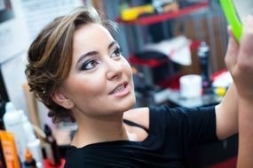 beautiful smiling woman under makeup