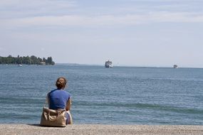 lonely girl by the sea