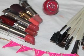 makeup tools, brushes and lipstisks