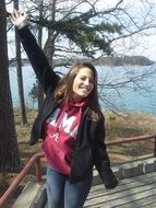 smiling woman on the lake background