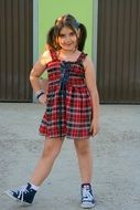 little girl in stylish clothes