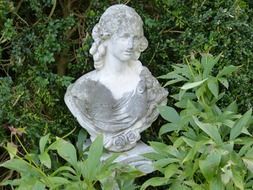 statue of a woman in the garden