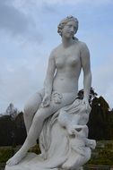 woman sculpture in park at evening, germany, potsdam, sanssouci