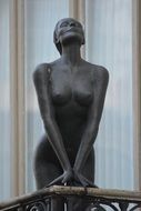 female statue on the balcony