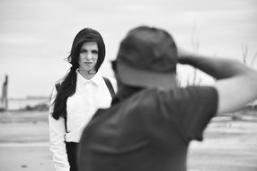 photographer takes a picture of a girl