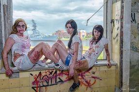 girls are dressed as the zombies