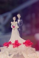 wedding couple figures on cake