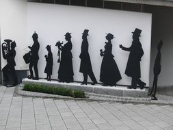 Sculptures in shape of human silhouettes