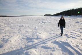 happy woman among winter landscape