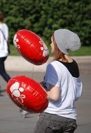 girl and red balls