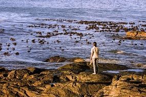 lonely girl on the sea beach