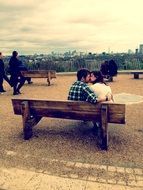 Romantic couple kissing in a park