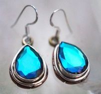 silver earrings with blue gemstone