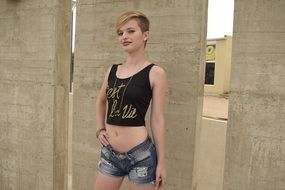 cool teen girl in shorts and crop top