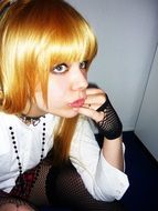 Thoughtful teenager with blond hair