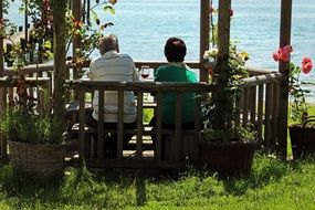 woman and man relaxing in the gazebo